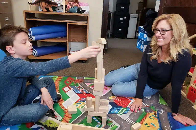 child playing with blocks